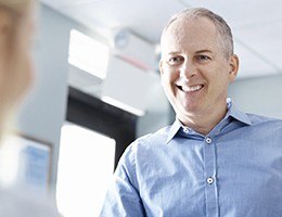 Man smiling in dental office