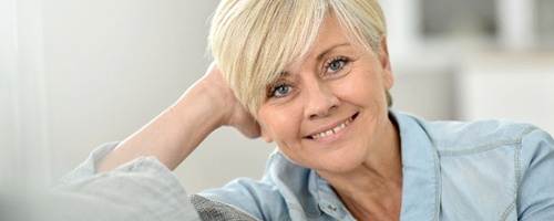 older woman blonde hair smiling