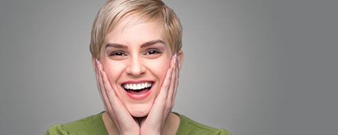 Woman with short hair smiling after completing FastBraces® in Mesquite