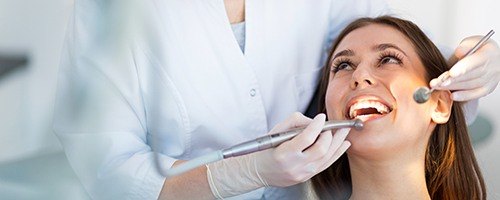 Closeup of patient receiving dental exam