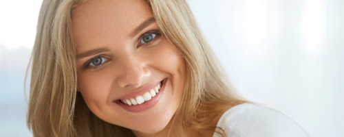 Woman smiling with white teeth