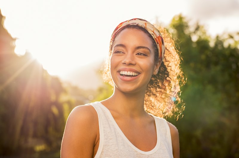 smiling in summer sun oral health benefits