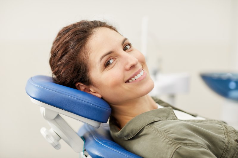 person who had root canal therapy smiling 