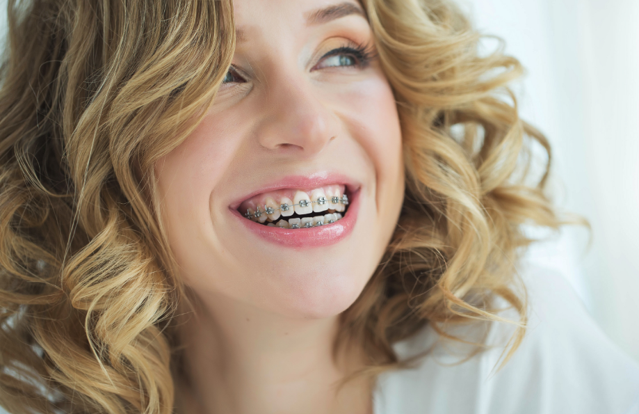 Woman with braces smiling